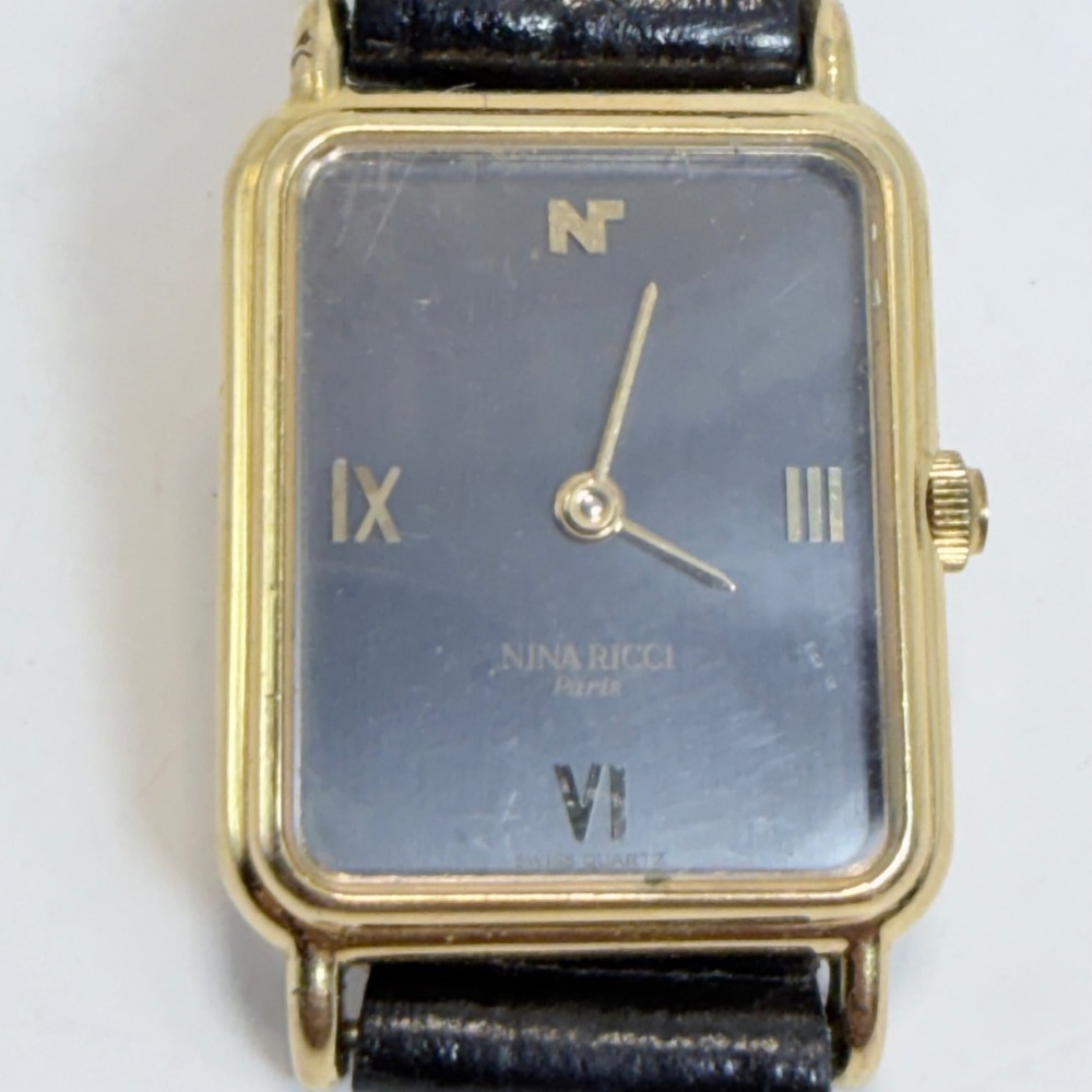 Nina Ricci Paris Vintage Tank Watch Gold Tone Swiss Quartz Black Dial 570